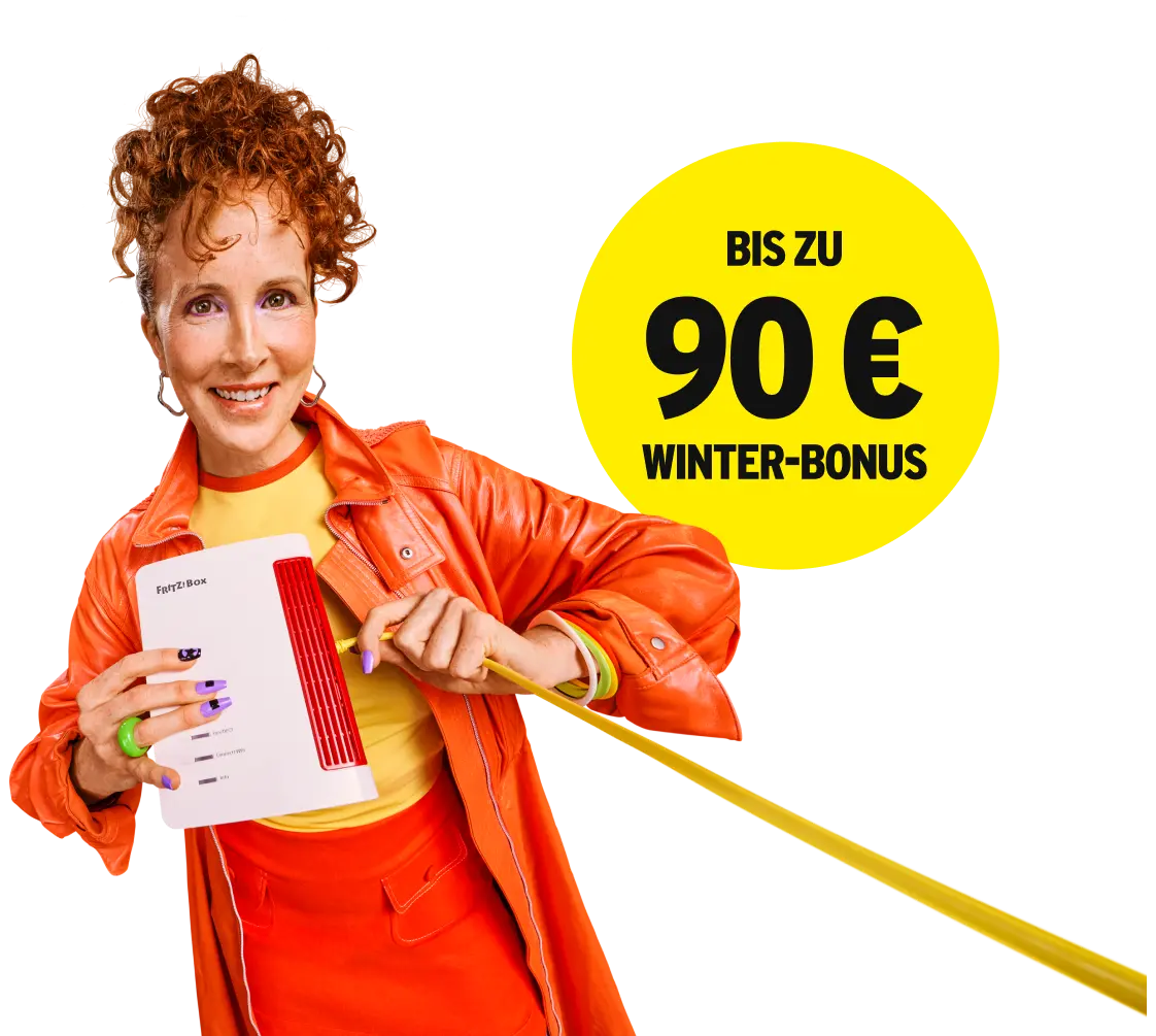 Person zeigt Fritz!Box. Bis zu 90 € Winter-Bonus.